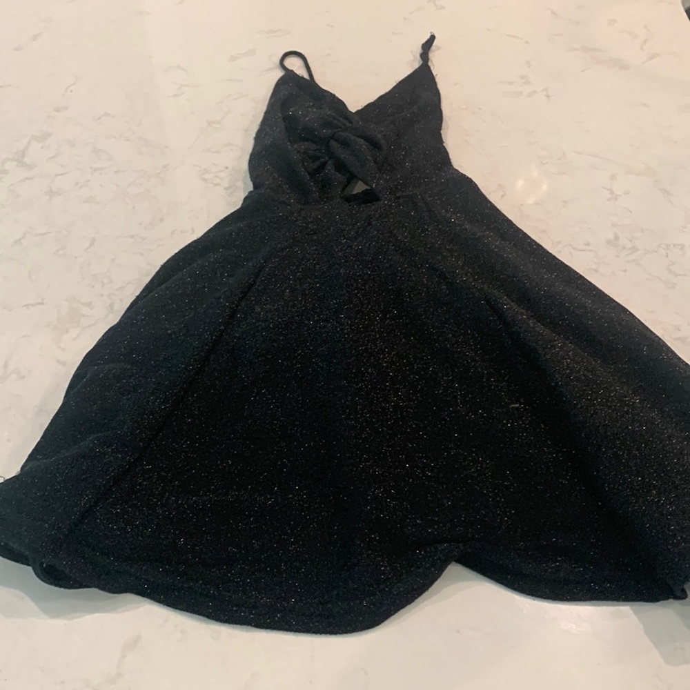 Sparkly mini dress with open back